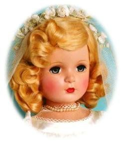 Retro doll wearing a lace dress
